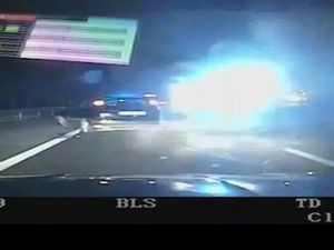 Supporting image for story: Footage released of motorway crash which left police car in flames