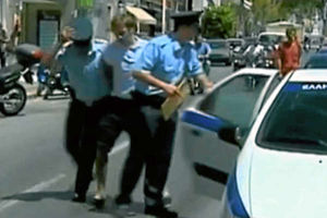 Luke being arrested on suspicion of murder on May 16 on the Greek island