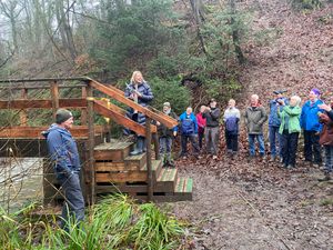 The picture shows the bridge being reopened by trustee and local councillor Carolyn Healy.  