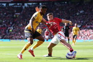 Nelson Semedo of Wolverhampton Wanderers battles for possession with Harry Amass(Photo by Wolverhampton Wanderers FC/Wolves via Getty Images)