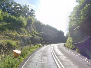 Supporting image for story: Road closed after car ends up on its side following crash at 4.30am