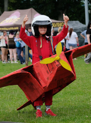 Oscar Davies in his Red Arrows aeroplane won the best dressed individual and received the cup in memory of Joyce Bufton. Andy Compton image

 