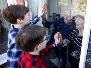 Supporting image for story: Children urged not to hug grandparents until vaccine rollout impact is known