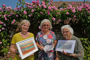 From left, Louise Hollan, artist Debbie Williams and home owner Anne Hartill.