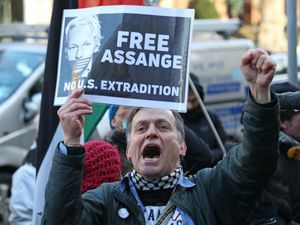 Supporting image for story: Police detain seven people over Covid-19 breaches at Assange bail hearing