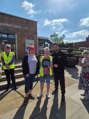 Shaz Saleem (right) and Gail Bradley (left) present to Joanne Fletcher (centre)