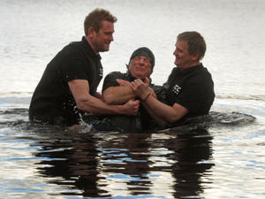 Supporting image for story: Say a prayer for Mike as he gets baptised in Ellesmere's freezing cold Mere - with pictures and video
