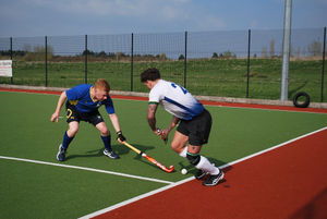 Stourport's Rob Lashford challenges a Stafford forward