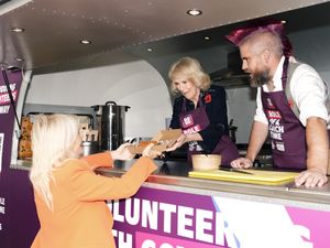 Supporting image for story: Queen a natural at serving jacket potatoes, says social media star Spudman