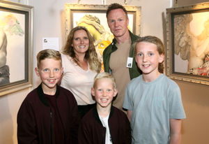 Jody Craddock with his wife and children at an exhibition of his work