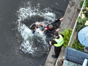 Supporting image for story: Dramatic photo shows moment man is arrested in chase across Dudley canal