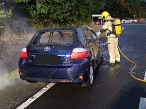 Supporting image for story: Pictures show the car fire which destroyed vehicle off the A5 near Oswestry