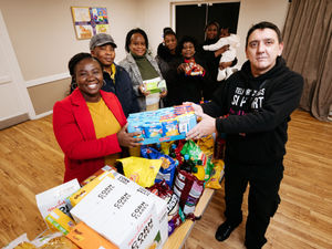 Supporting image for story: Charity hands over £200 to Telford food bank