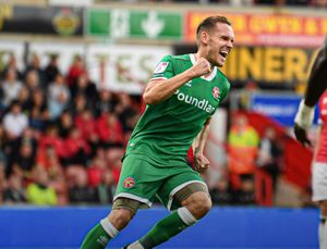 Chris Hussey celebrates pulling one back (Owen Russell)