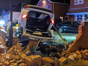 Supporting image for story: Driver flees after car hits wall and lands on roof in Walsall