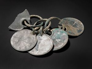 Supporting image for story: Museum staff describe ‘magical’ moment hoard’s silver colour was revealed