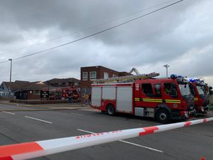 The road was cordoned off. Photo: John Kennett/West Midlands Fire Service