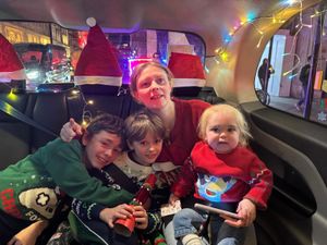 Supporting image for story: Cabbies give Christmas lights trip to children from Great Ormond Street Hospital