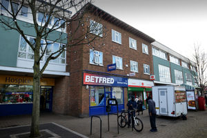 Shops at the front of the flats where young Jeremiah lived
