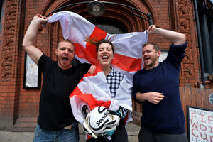 Nigel Moore, Sam Dewhirst and Simon Blaney get ready to celebrate outside the Hogshead in Wolverhampton city centre