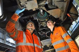 Engineers work on the trains at Machynlleth to get them back up and running
