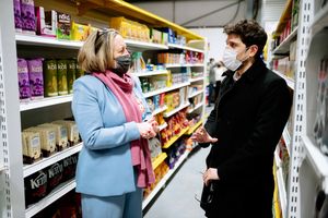 Anne-Marie Trevelyan chats with Turancan Salur at the opening of the warehouse