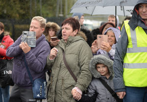 People braved the rain showers to watch the games 