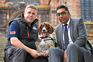 Dog handler Stuart Phillips, Scamp and Paul Dosanjh from Wolverhampton Council