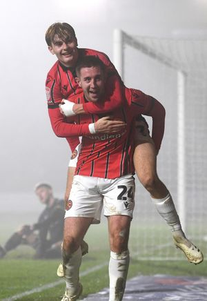 Harry Williams celebrates his goal with Nathan Lowe.