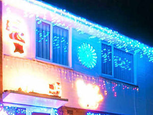 Supporting image for story: Maureen's all lit up for Christmas