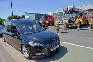Firefighters at Walsall Fire Station turned out in full kit to honour a 100-year-old former firefighter and war hero George Stokes.