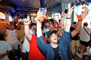 Fans cheer England in the Royal London