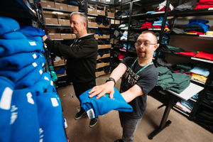 Volunteer Dale Tyler and operations manager Simon Lellow prepare the free school uniforms amid the charity's busiest ever year