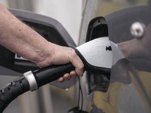 Supporting image for story: Signs for EV chargers to be fitted on major roads