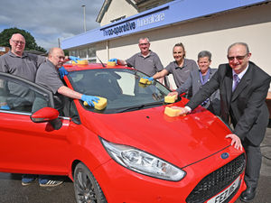 Supporting image for story: "It's a charity close to our hearts' Dudley funeral firm running charity car wash service