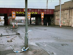 Supporting image for story: Man, 60, remains in critical condition after bus hits rail bridge