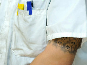 Supporting image for story: POLL: Would getting a tattoo hold you back where you work?