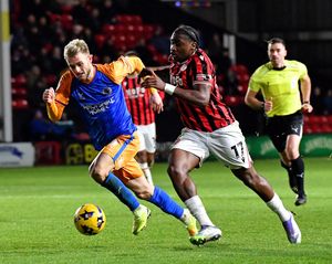 Taylor Perry in action for Shrewsbury against Walsall