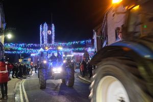 The illuminated and decorated tractors coming down Kington’s High Street to the cheers of the crowds. Image by Andy Compton