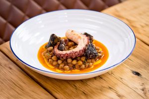 Braised octopus with morcilla and chick pea stew