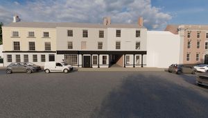 Plans would see vehicular access created through one of the listed buildings. Photo: Base Architecture & Design Ltd.