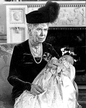 December 15, 1948: Prince Charles is christened. Holding him is his maternal great-grandmother Queen Mary, widow of King George V
