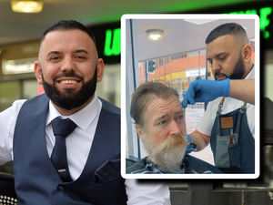 Supporting image for story: Barber who gave homeless man makeover is giving back to city after arriving as refugee