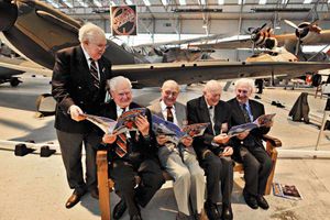 Taking a look at the book are veterans Tim Wellings, Martyn Hansford, Des Main, Colin Fisher and Ken Wilkinson