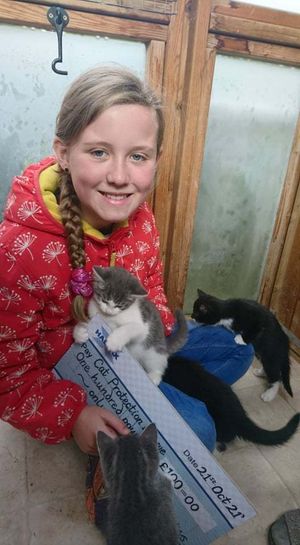 Jenny with the cats at Cats Protection