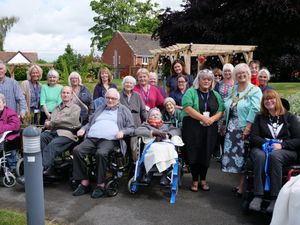 Kerry Evans from Wrexham AFC (far right) along with Wrexham Mayor Cllr Tina Mannering visited to officially open the Chirk Court Sensory Garden.