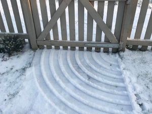 Supporting image for story: Everyone is making the same joke about this oddly satisfying gate in the snow