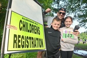 Paul Beagen, with Cole, 7, and Beau, 10, Beagen from Shelfield, had just finished signing up for the event
