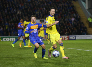 Jordan Clark of Shrewsbury Town and Gary Cahill of Chelsea. (AMA)