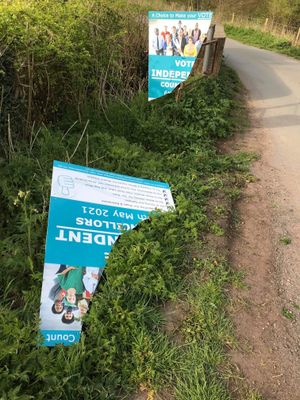 Some signs have been torn in half